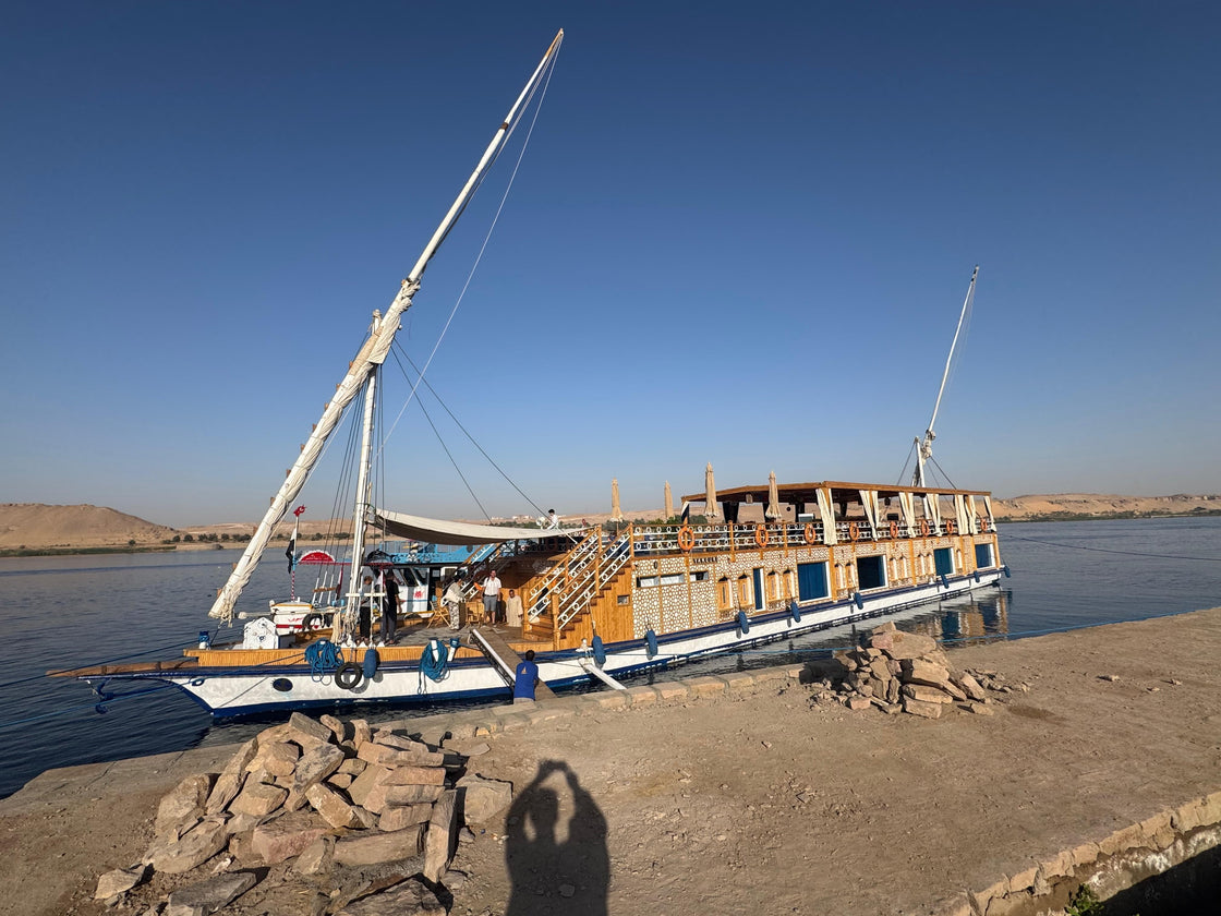 Classic Dahabeyya boat on the Nile during an Easter cruise from Luxor to Aswan, Egypt, with scenic Nile views.
